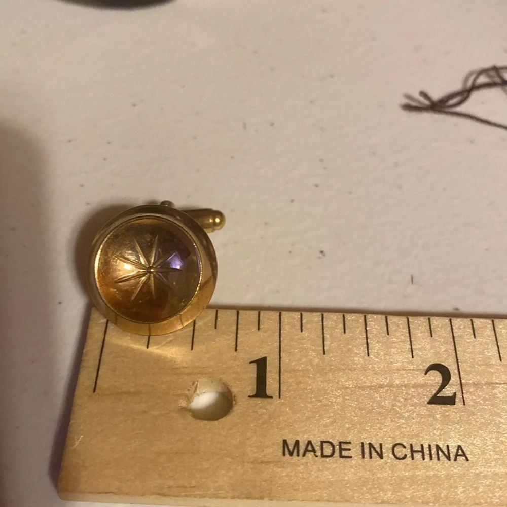 Set of 2 vintage cuff links.  Gold tone/ silver tone. Silver pair are Anson